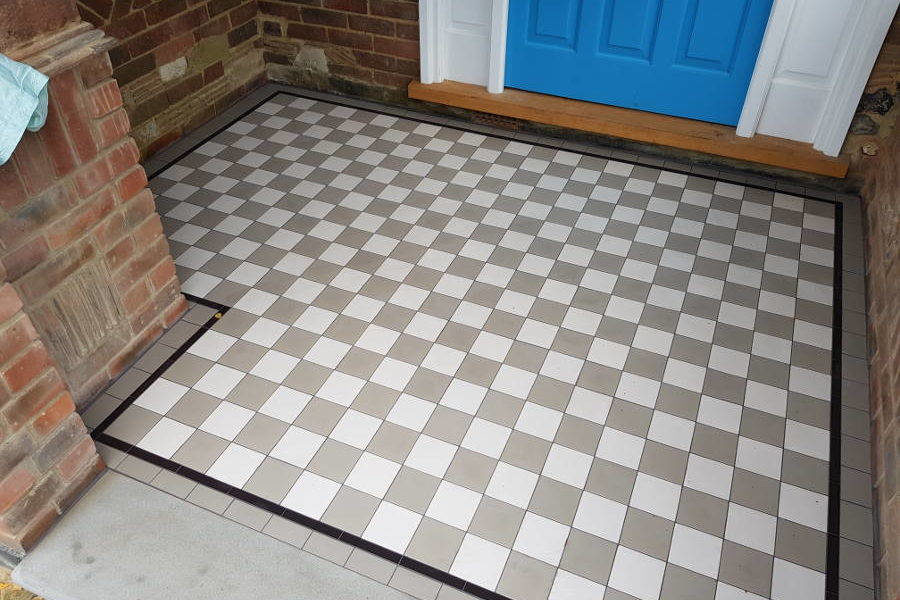 Brown And White Square Victorian Tiles In Porch Area